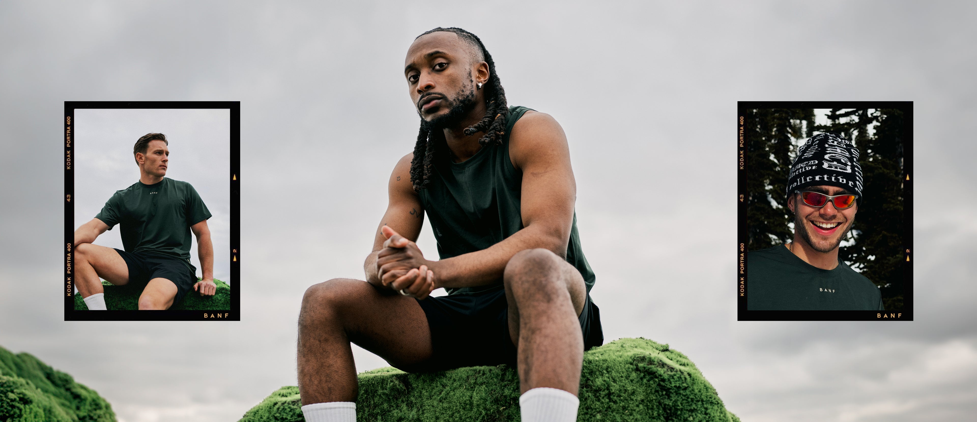 Man sitting on grassy rock wearing Banf vest.